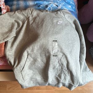 Hi! This is a New Womens Nike hoodie. It is size XL and is new!!